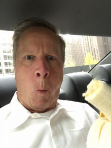 Man eating banana